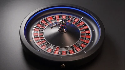 Rouletterad mit blauer Randbeleuchtung auf Graphit - Live Casino bei Casea Casino